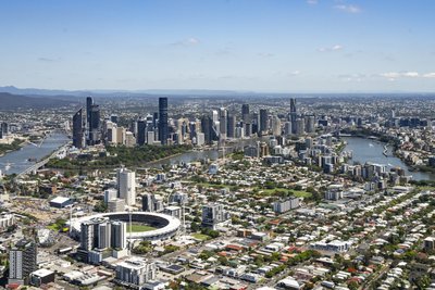 Aerial view of Brisbane CBD and the iconic Gabba stadium with the winding Brisbane River.