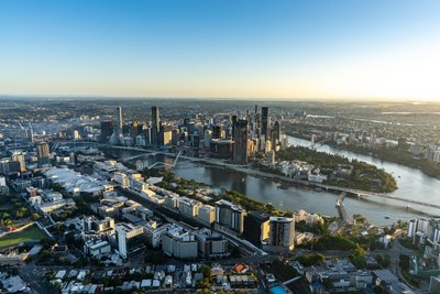 Aerial view over West End, Riverside Drive and the Brisbane skyline.