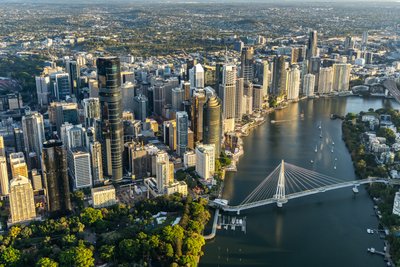 Aerial view over West End, Riverside Drive and the Brisbane River with Story Bridge in sight.