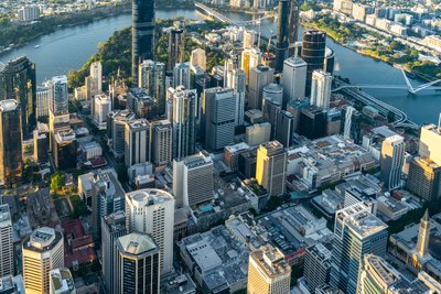 Aerial view of West End, Brisbane's vibrant cityscape along the Brisbane River.