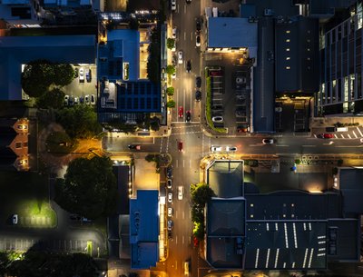Aerial night view of a busy intersection in Fortitude Valley, Brisbane CBD.