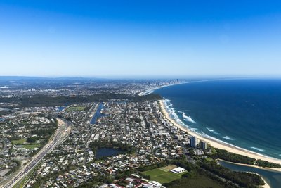 Aerial view of the Gold Coast coastline looking north towards Surfers Paradise with the Pacific Highway visible.