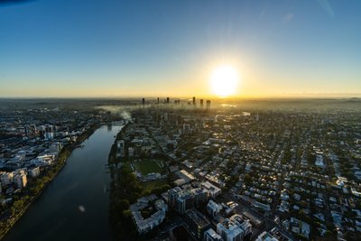 Aerial view over West End, Brisbane at sunset.