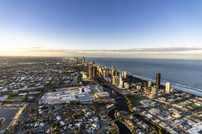 Aerial view over Broadbeach with Pacific Fair shopping centre and Surfers Paradise skyline beyond.